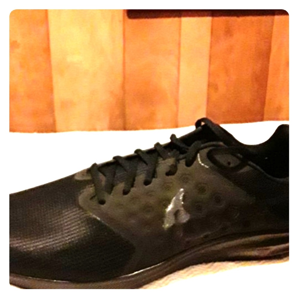 Nike shoes two black pair one size 7,other size 14